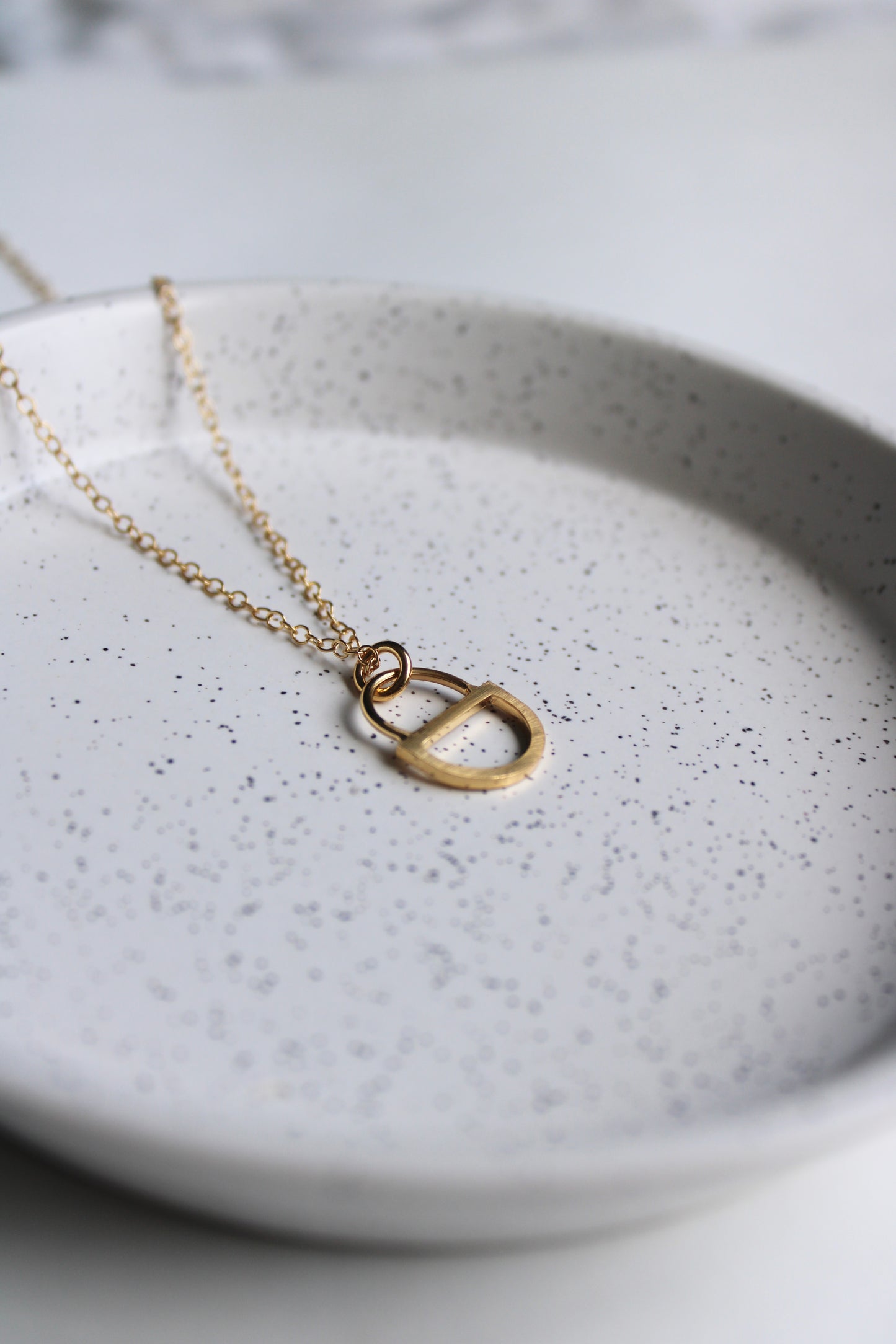 arc double pendant gold vermeil, on plate