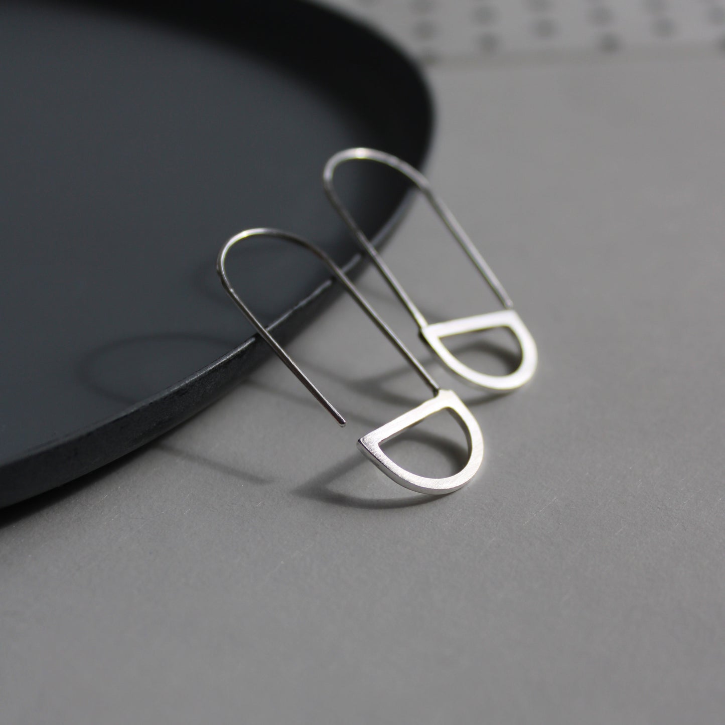 silver arc loop earrings