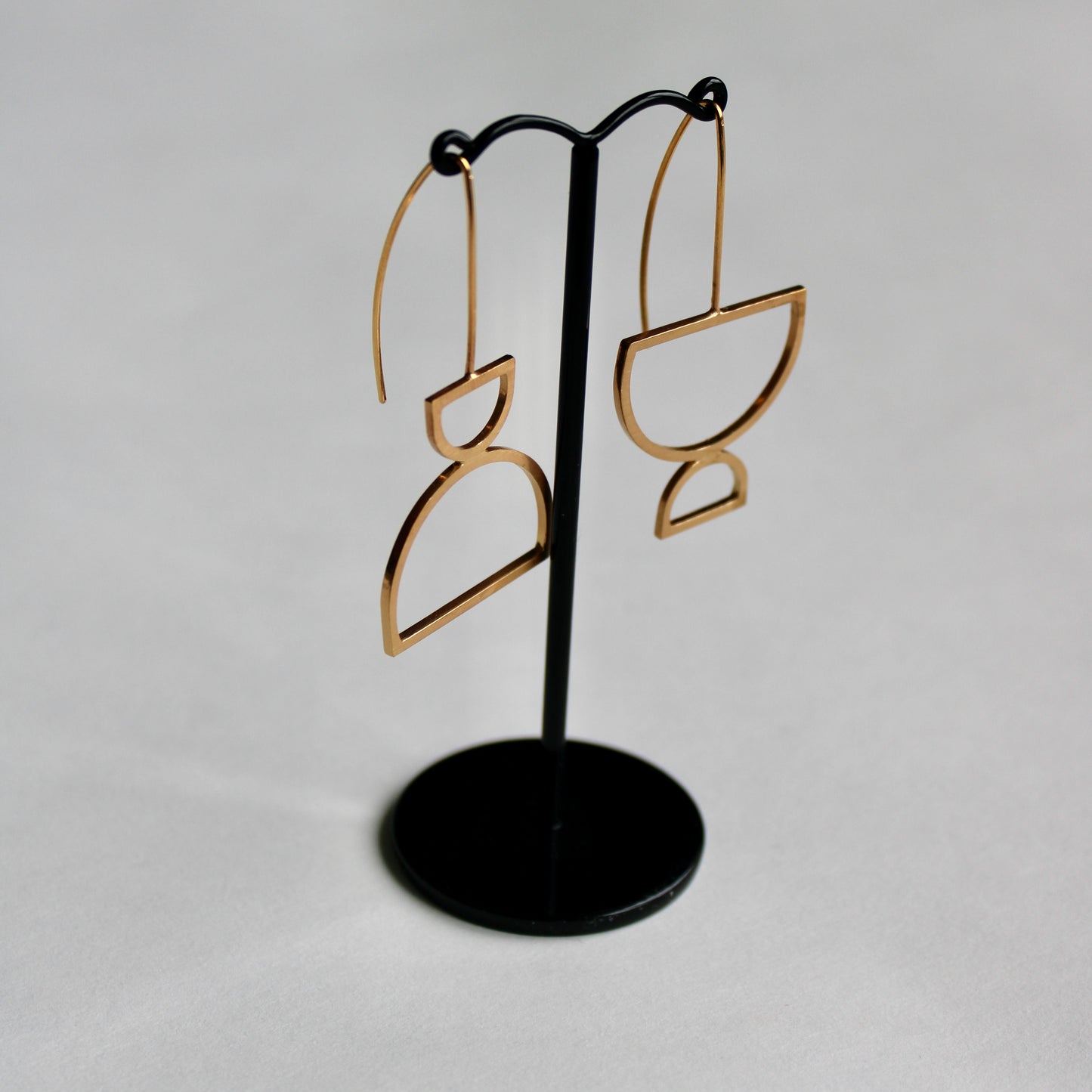 arc odd drop earrings gold