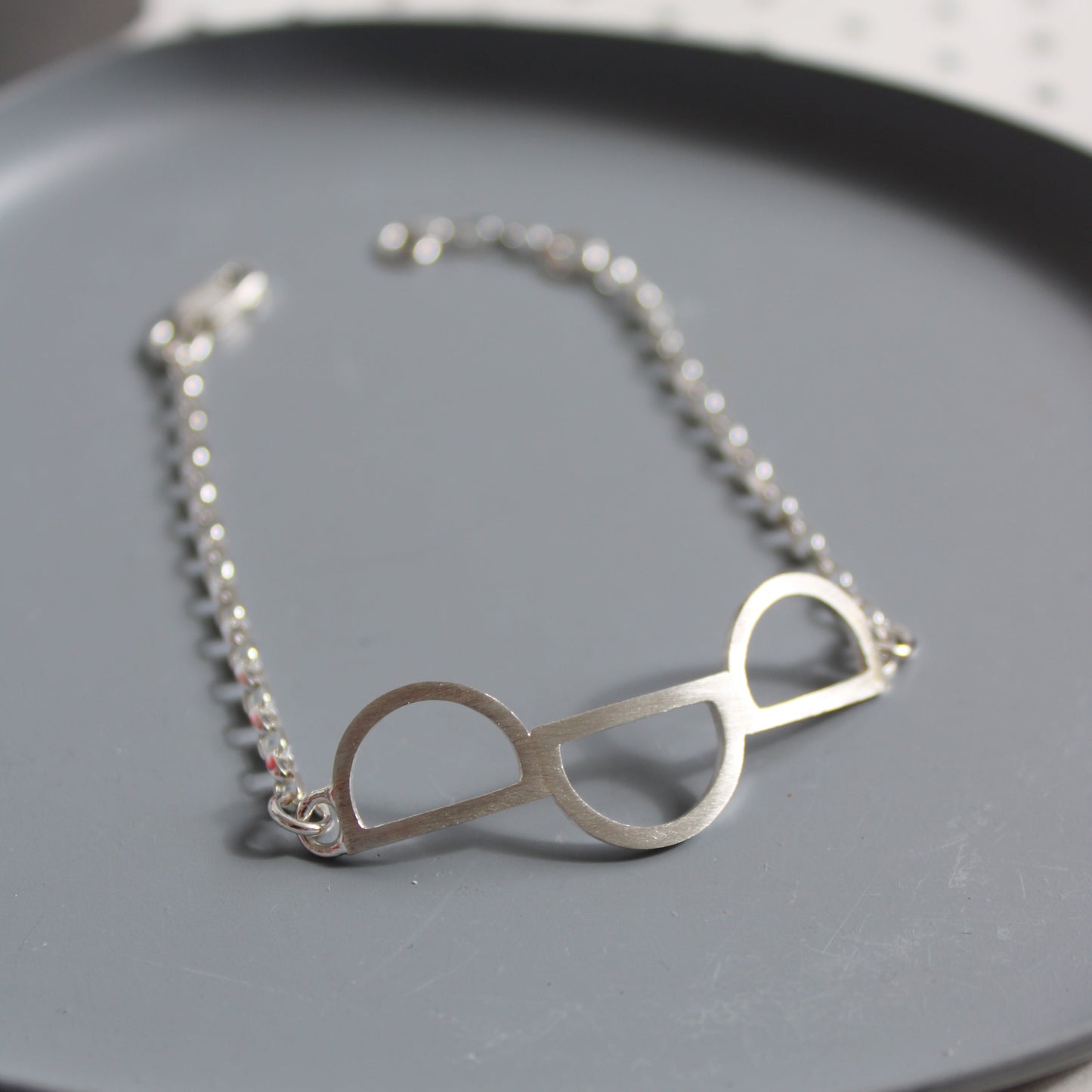 silver triple arc bracelet
