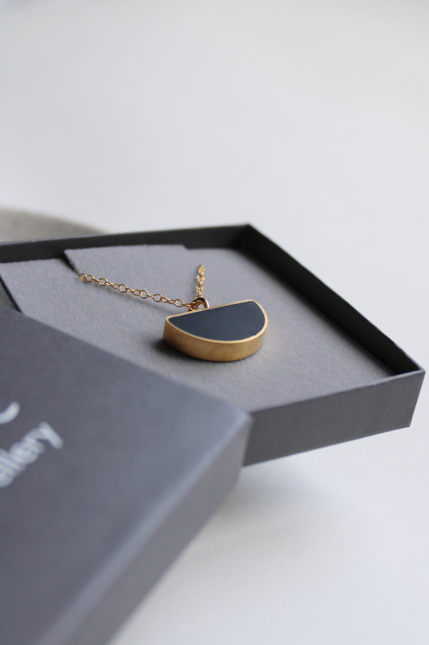 black resin arc pendant gold vermeil