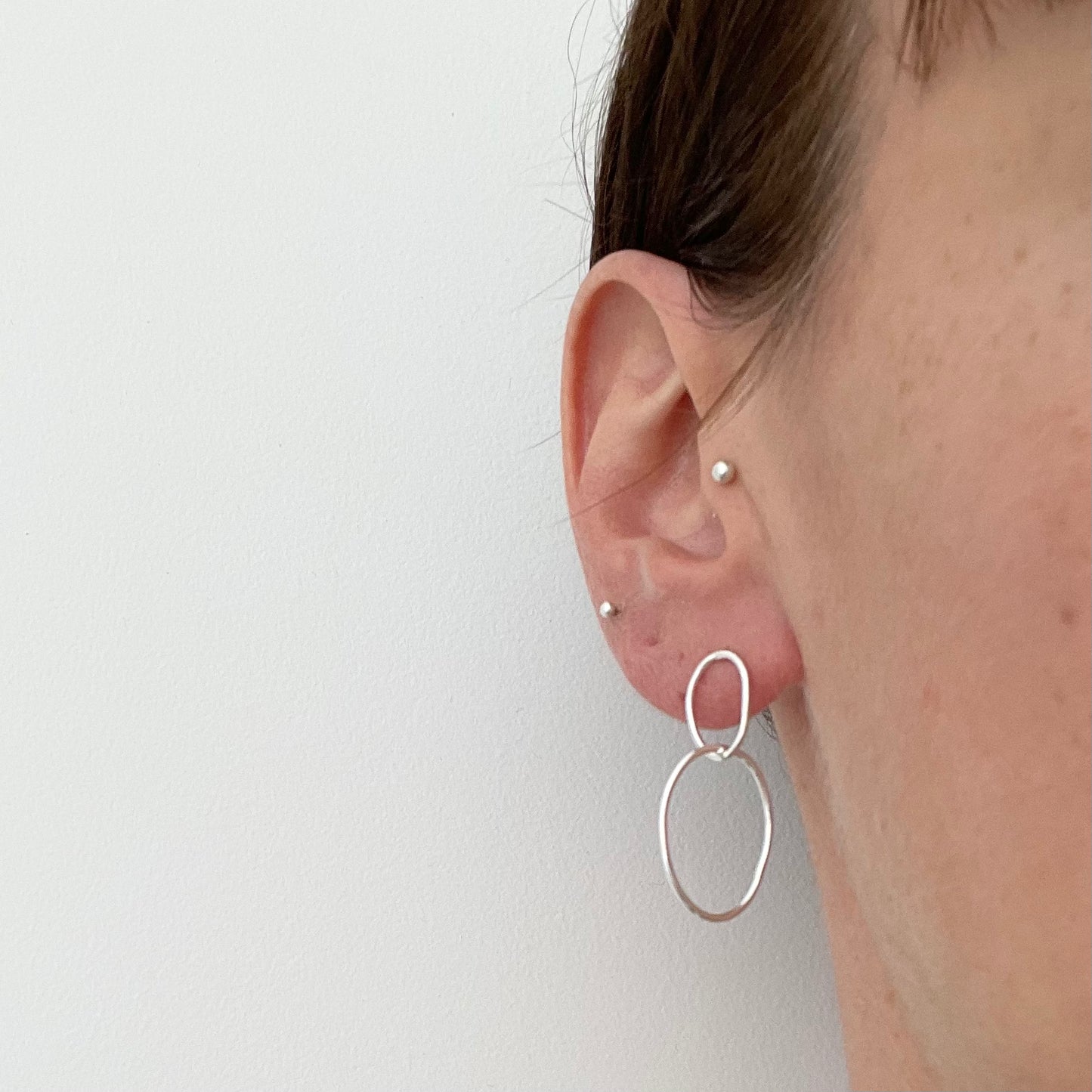 double pebble earrings worn