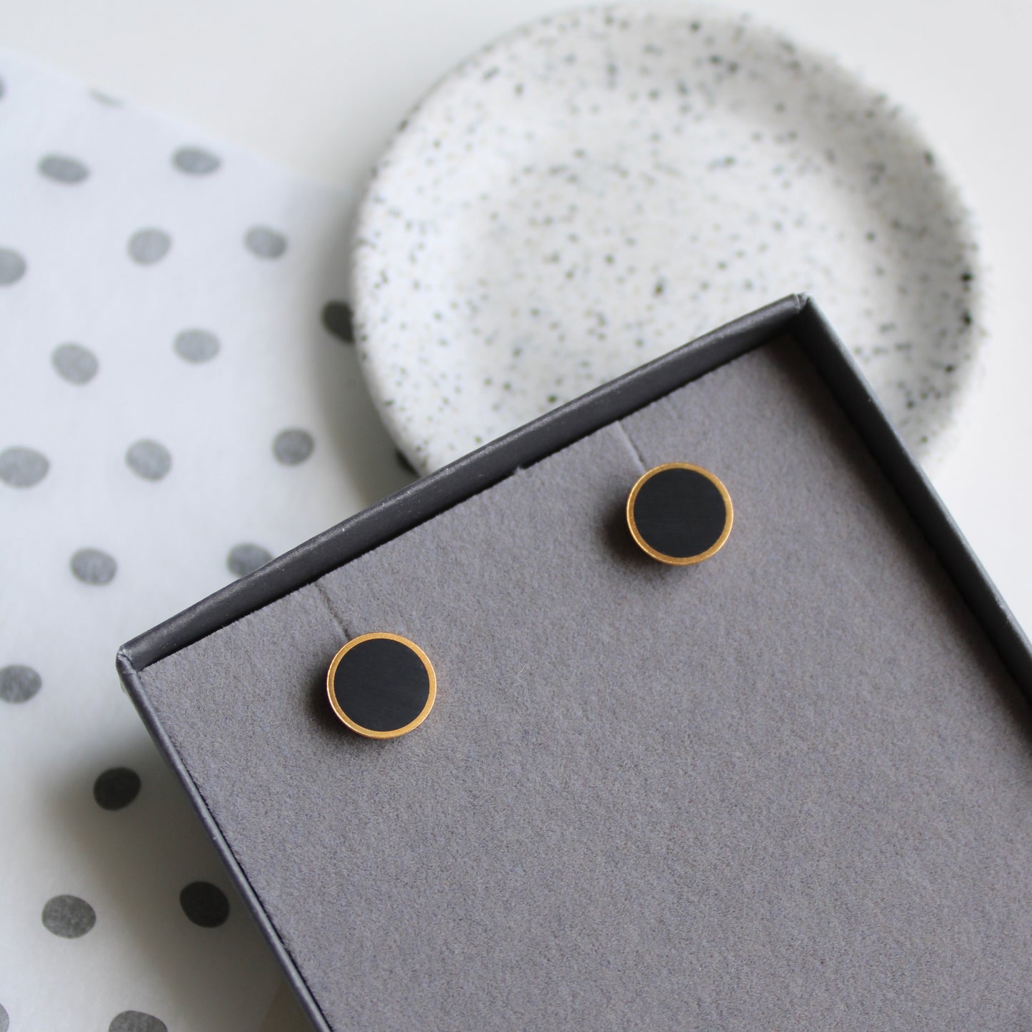 gold and black resin stud earrings