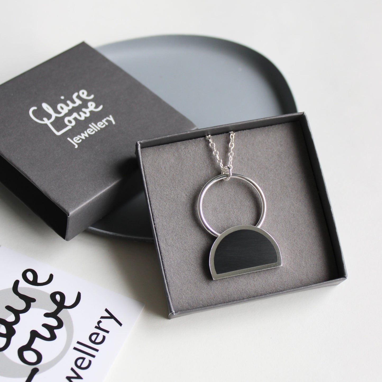 large black arc pendant