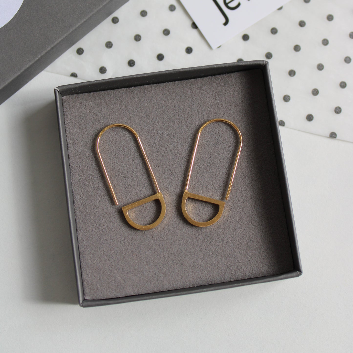 loop arc earrings gold