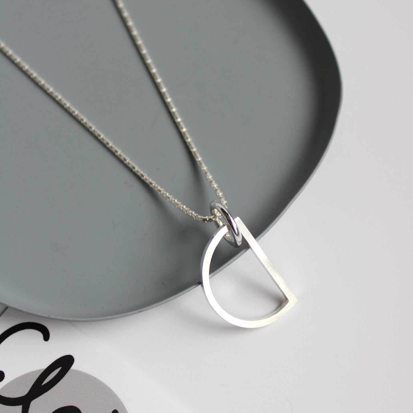 silver arc circle pendant