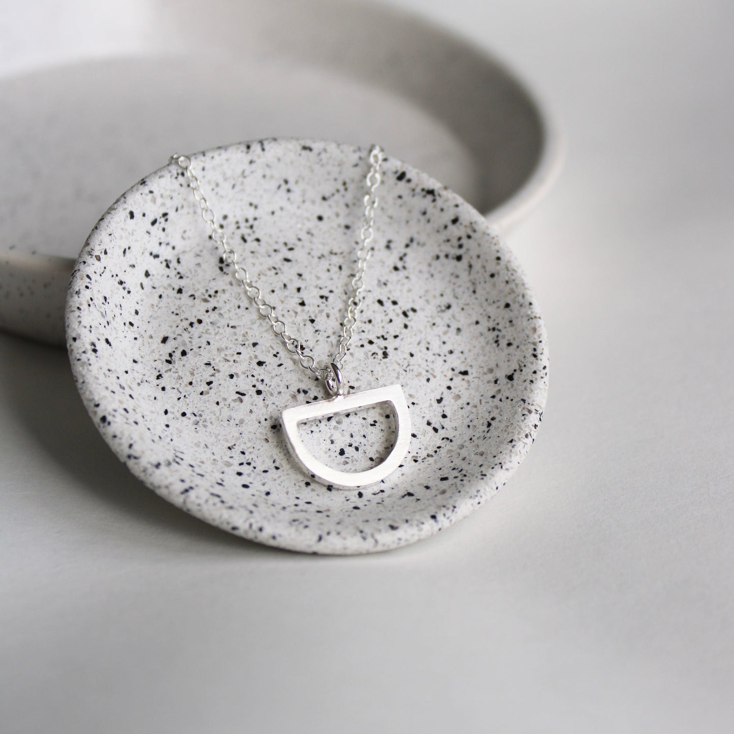 silver open arc pendant
