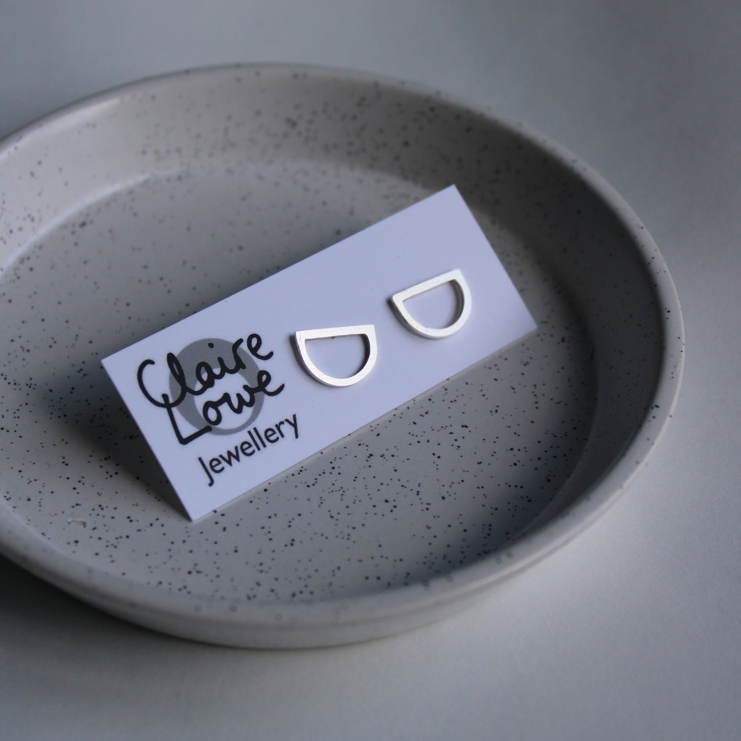 silver arc stud earrings