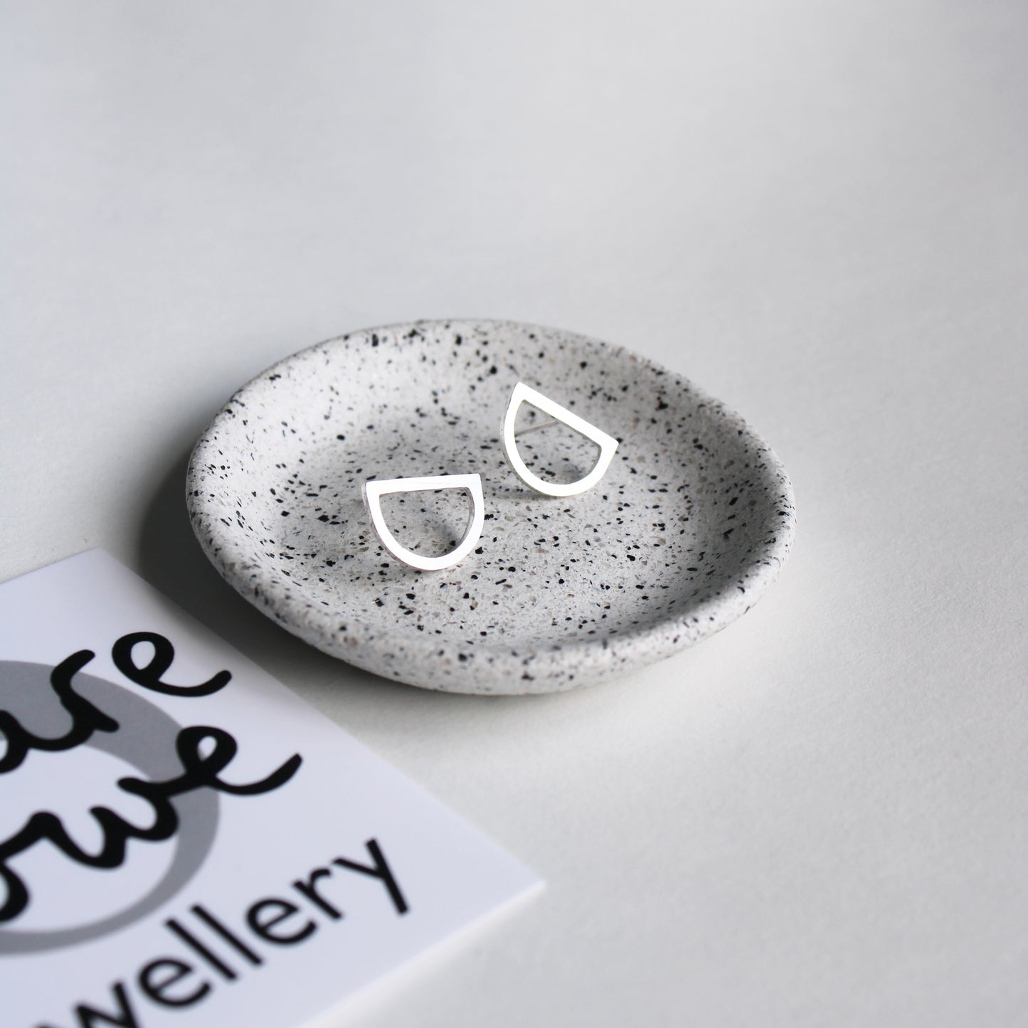 silver arc stud earrings