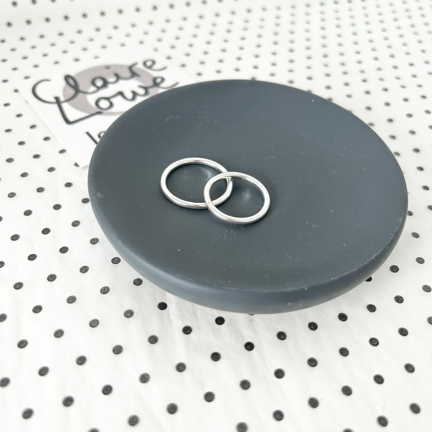 silver plain bands on a dish