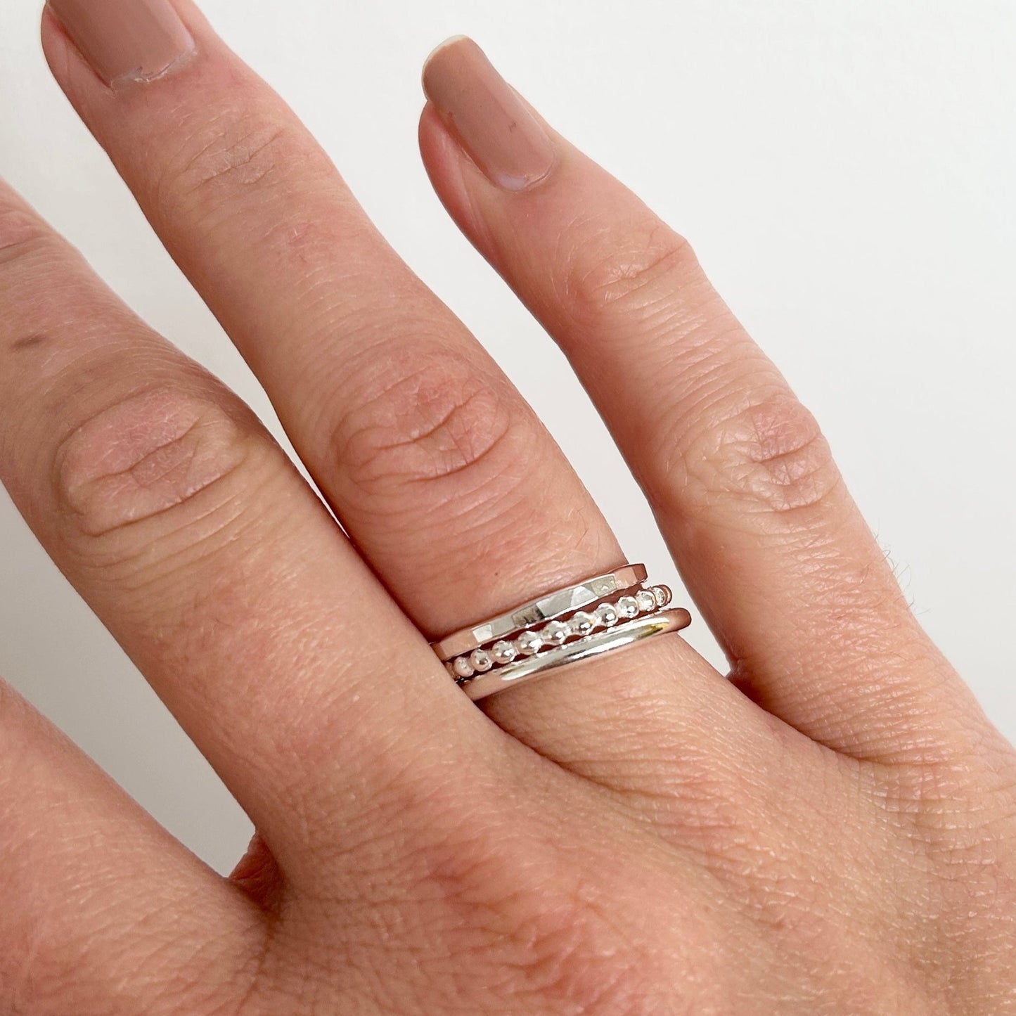 silver stacking ring set worn