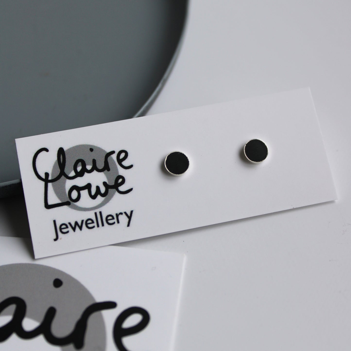 tiny black arc stud earrings