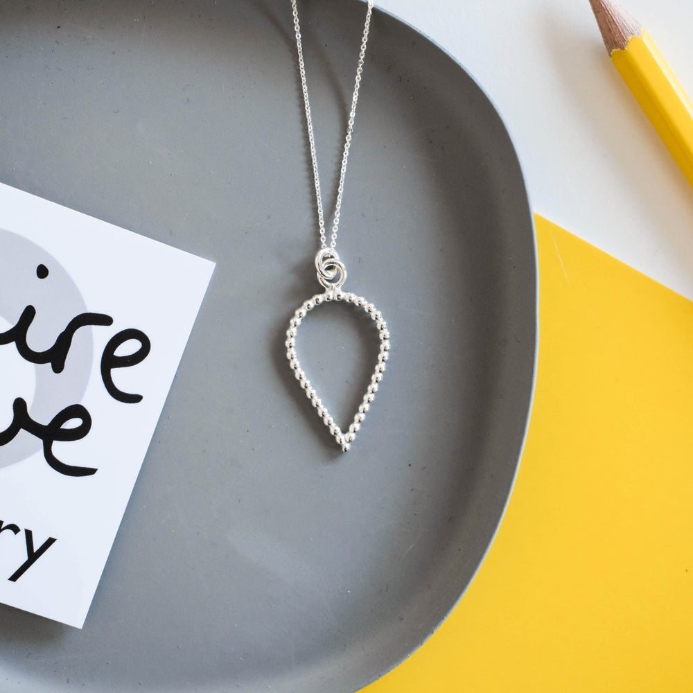 Dotty teardrop pendant