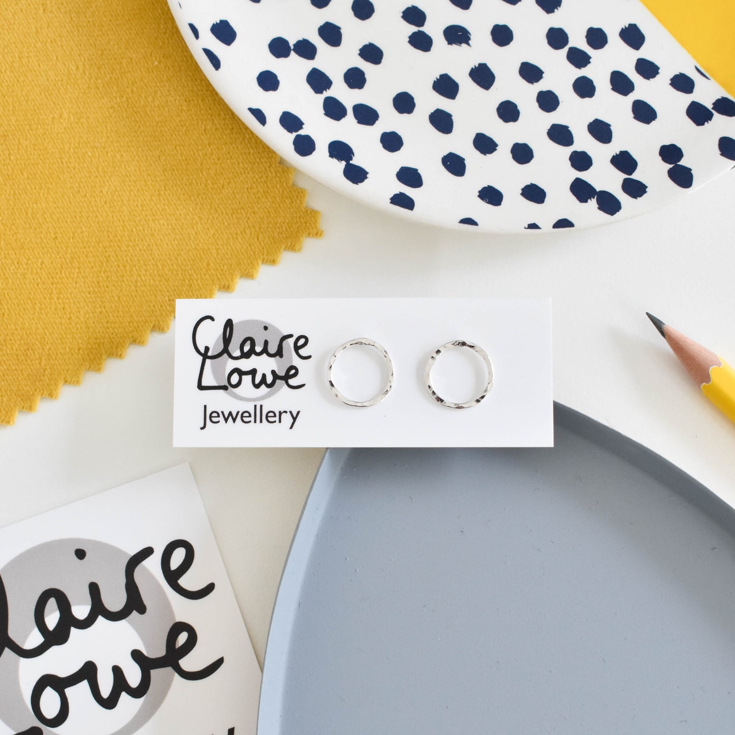 Silver beaten circle studs