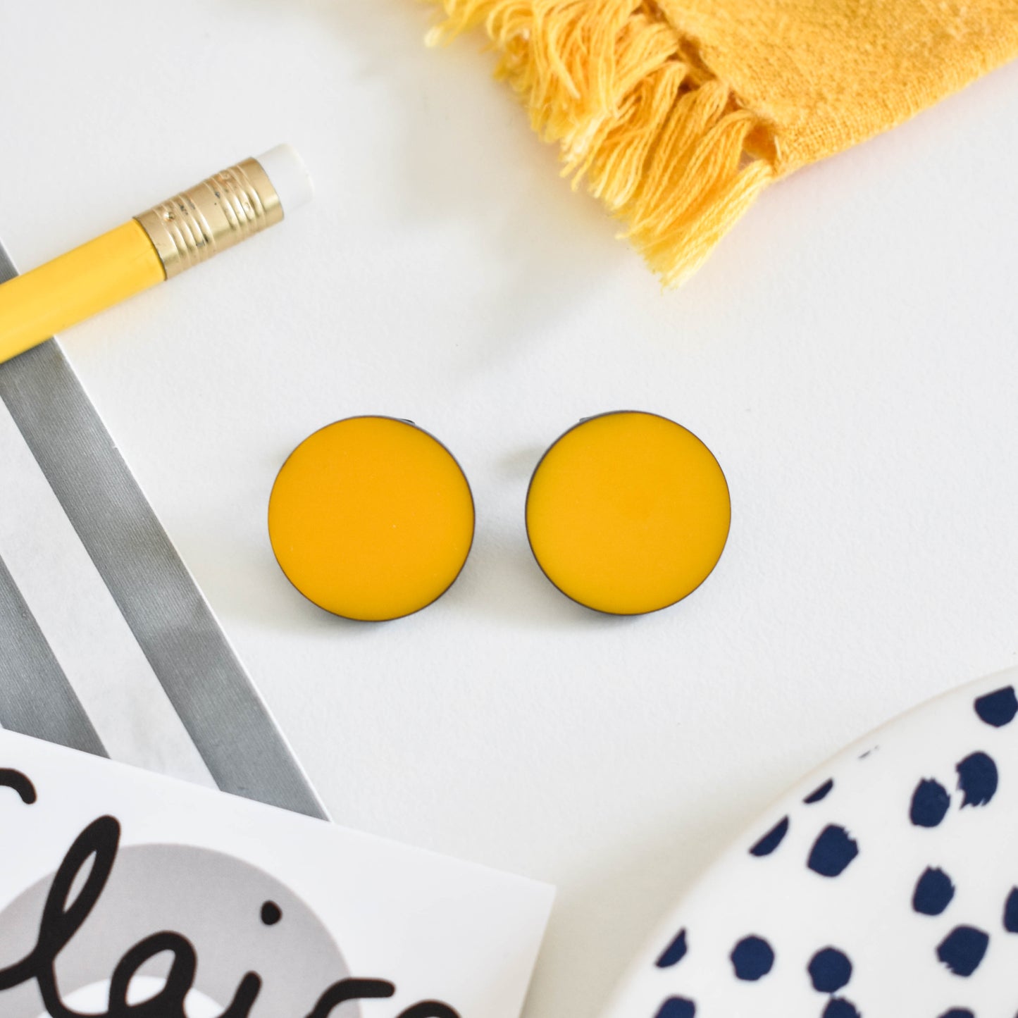 large yellow stud earrings