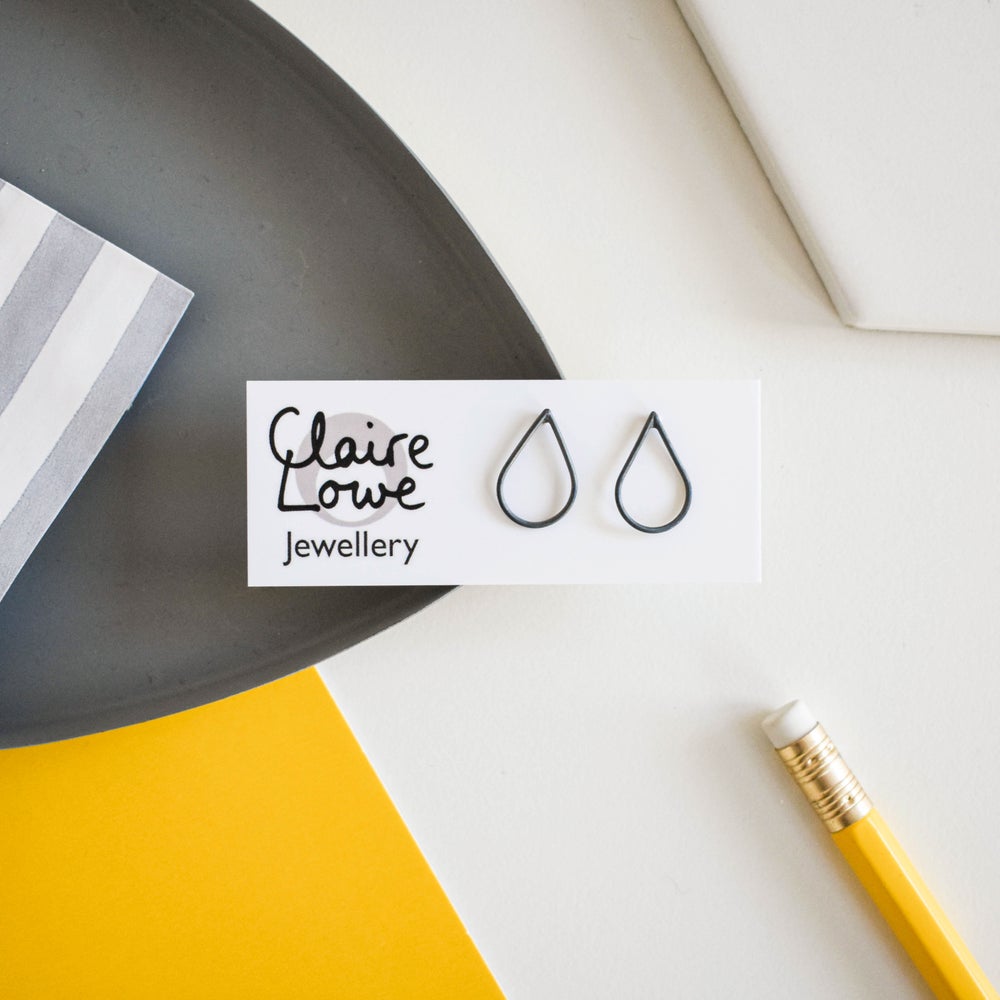 oxi silver stud earrings