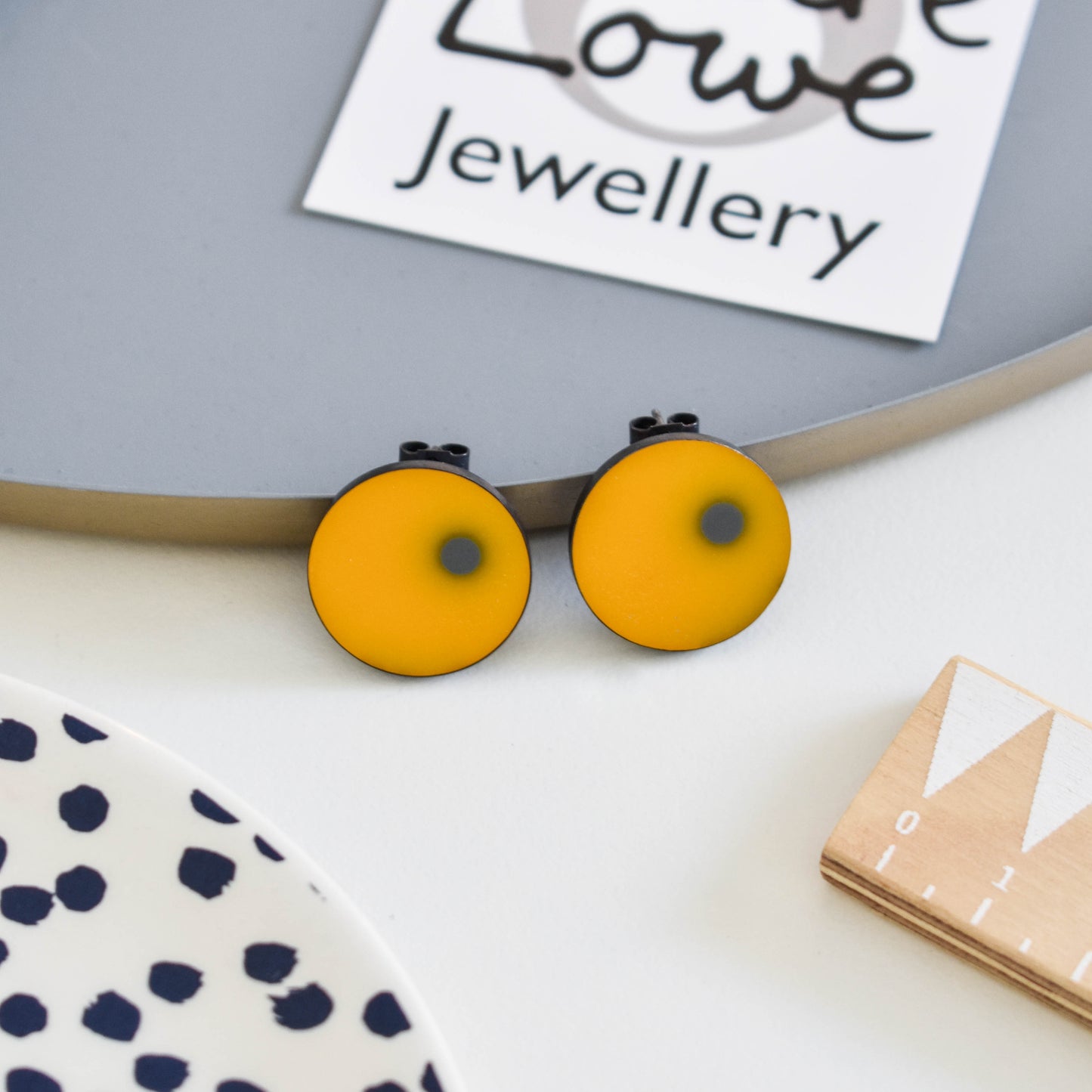 yellow and grey resin stud earrings