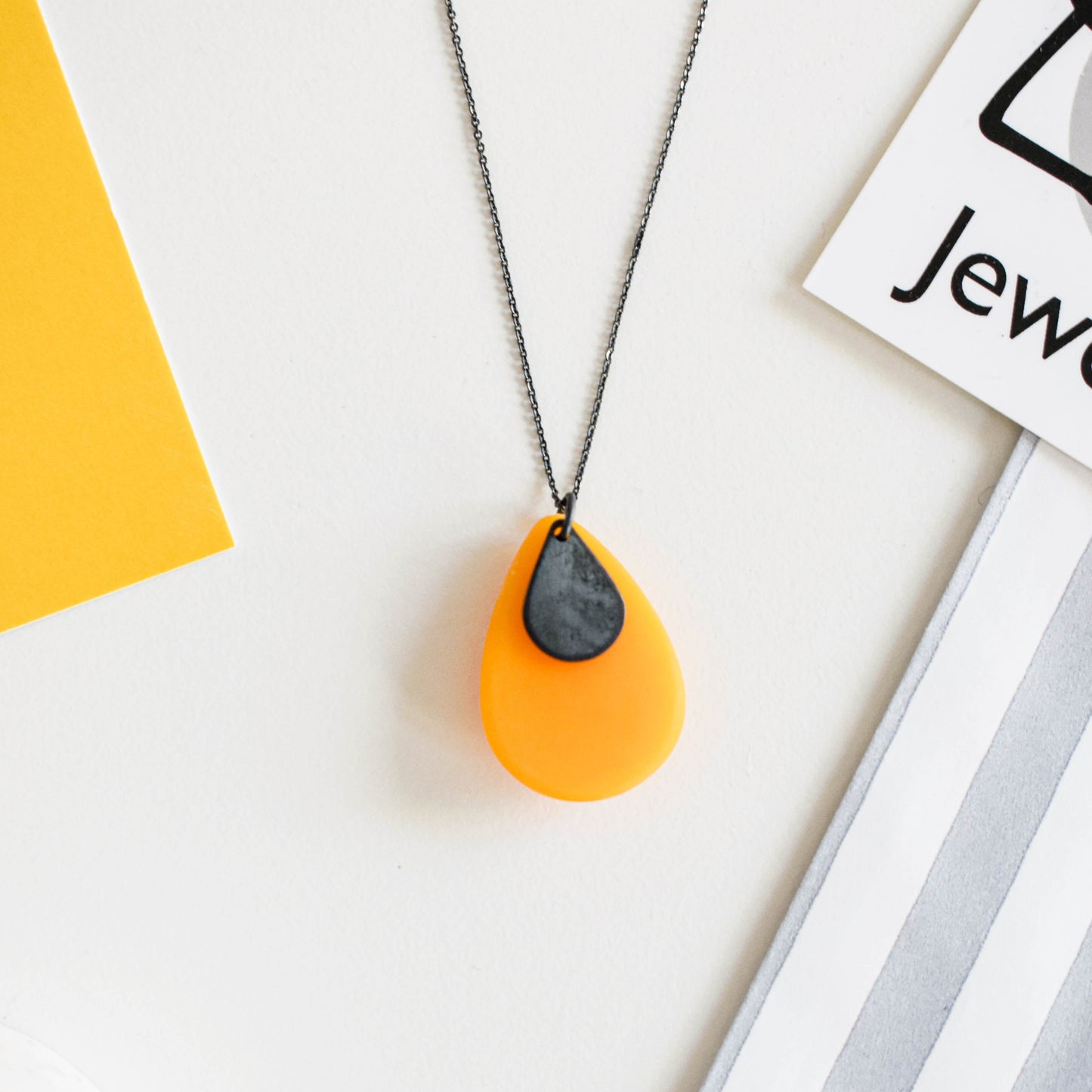 yellow resin pebble pendant