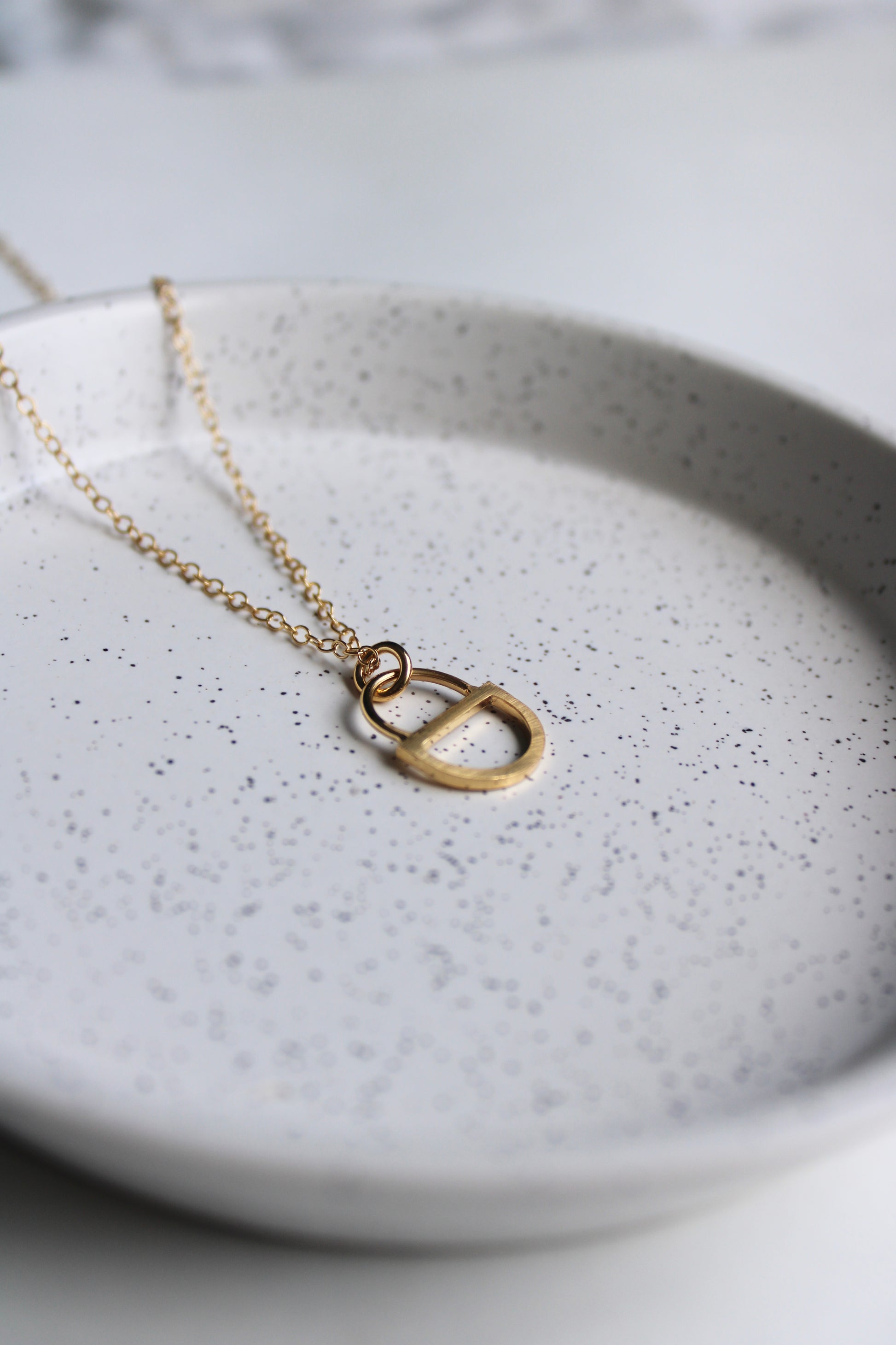arc double pendant gold vermeil, on plate