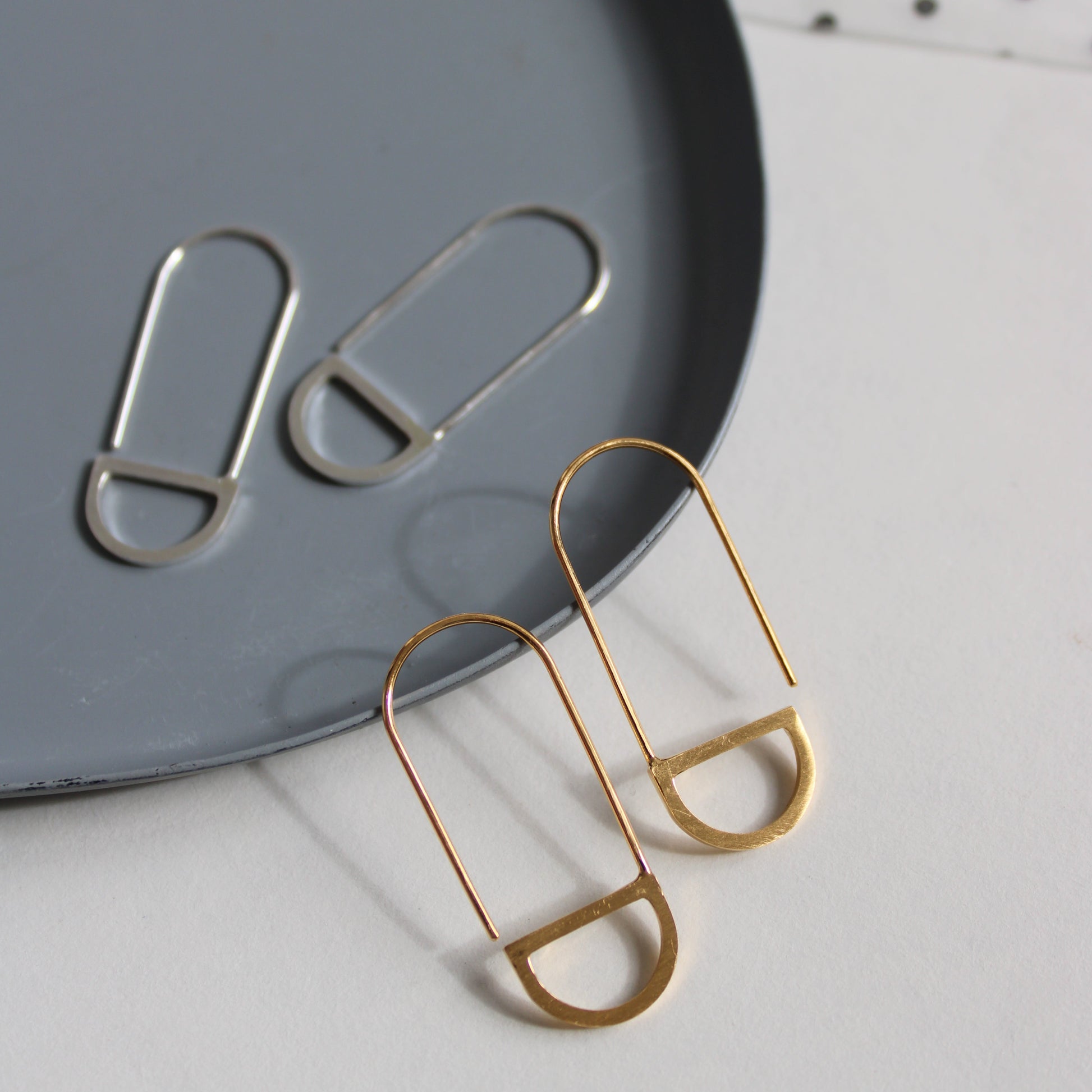 arc loop earrings silver and gold