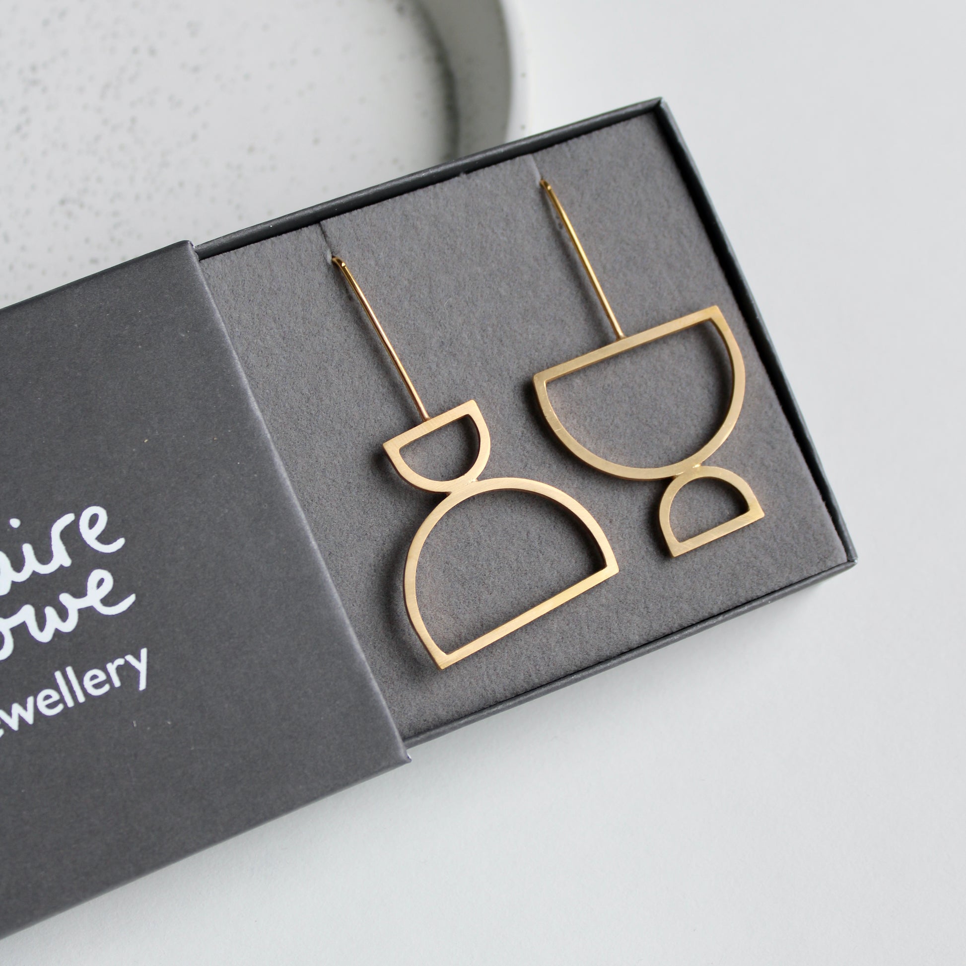 arc odd drop earrings gold in logo box