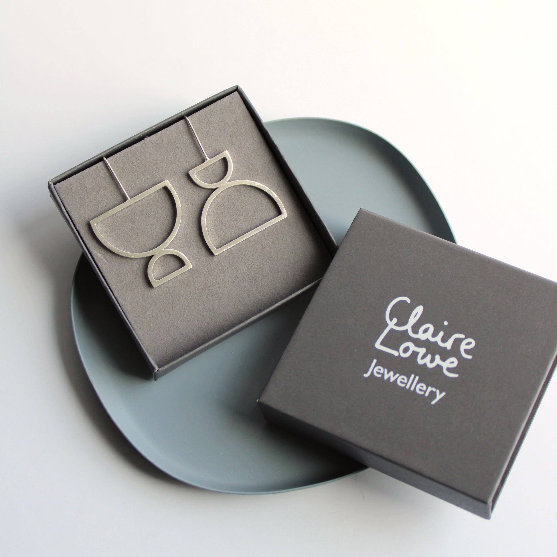 arc odd drop earrings silver, in box