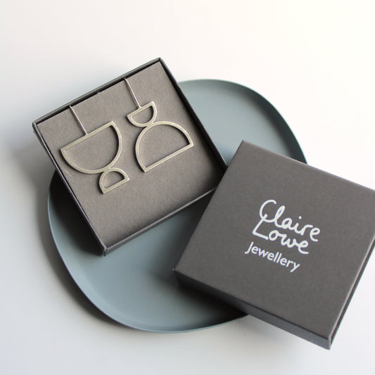 arc odd drop earrings silver, in box