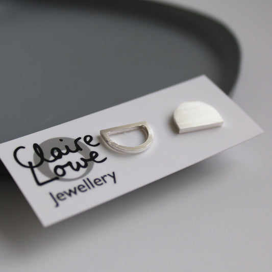 arc odd stud earrings silver