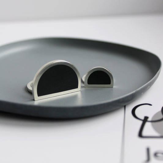 silver and black resin arc ring