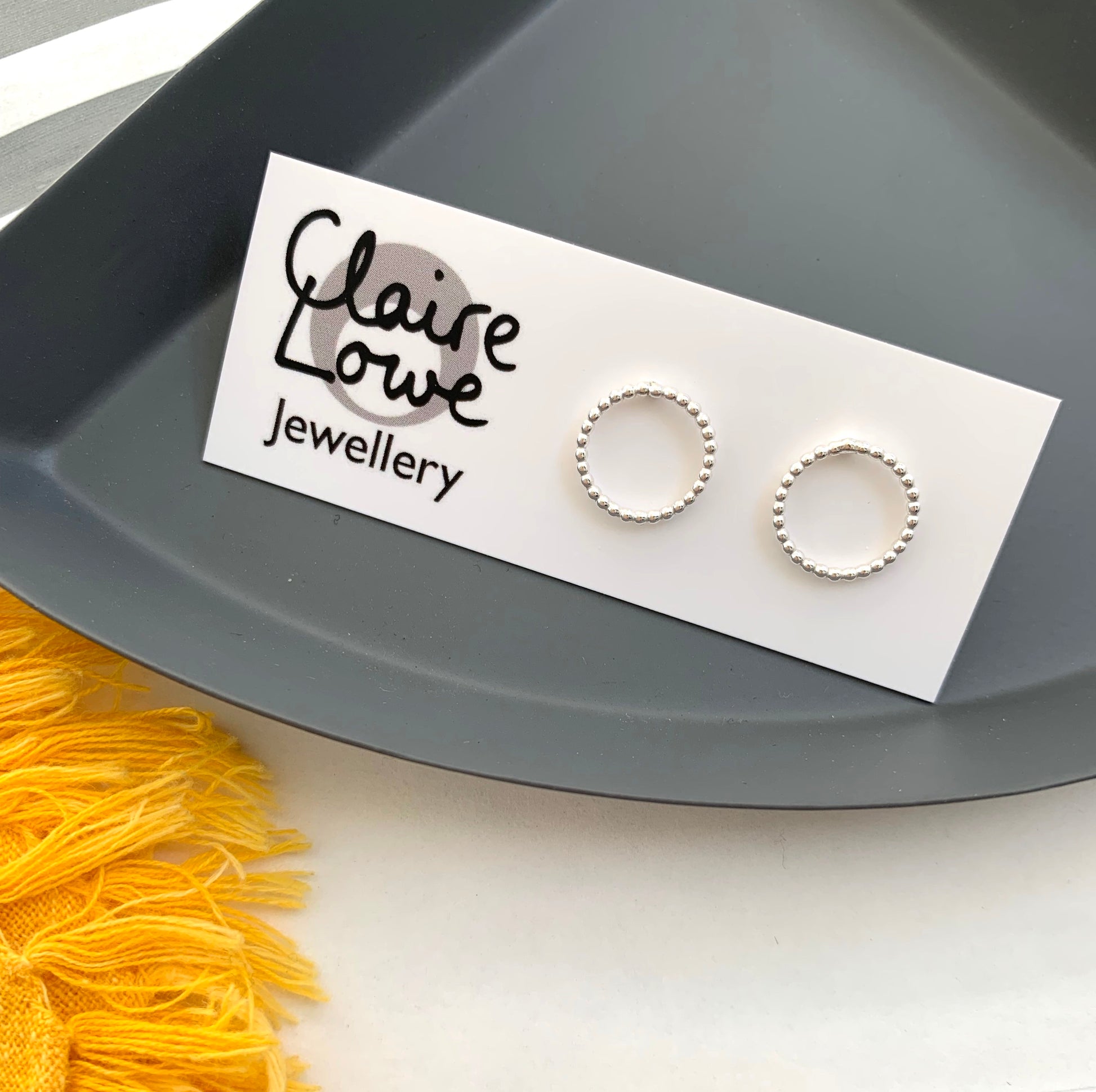 dotty circle studs on earring card