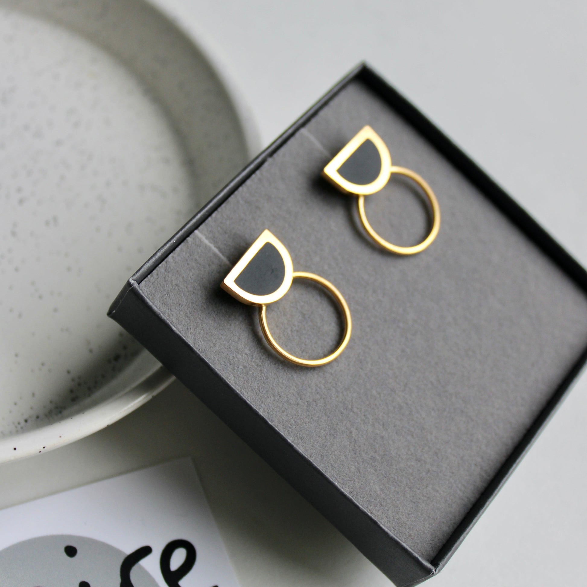 gold black arc and circle stud earrings