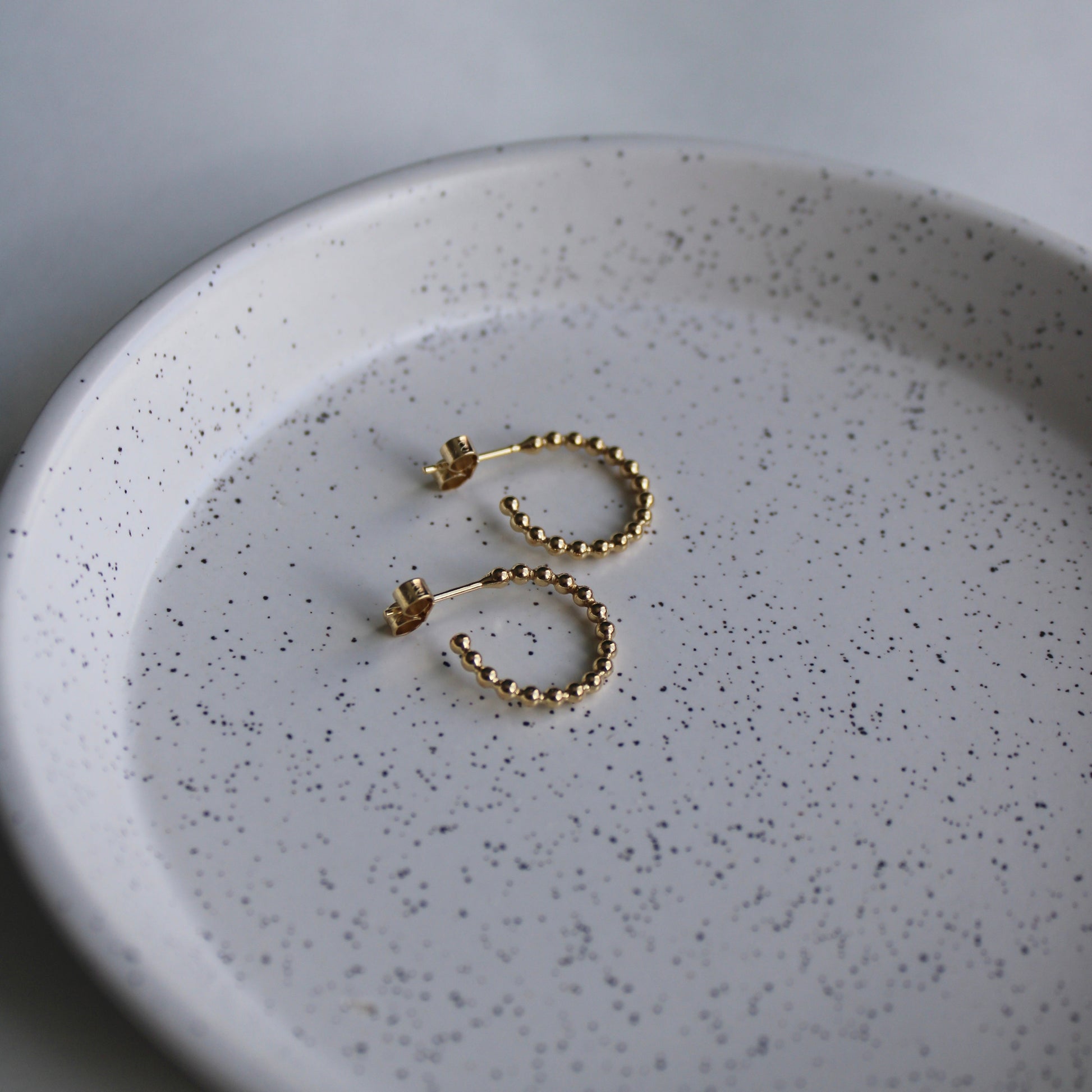 gold dotty hoop earrings