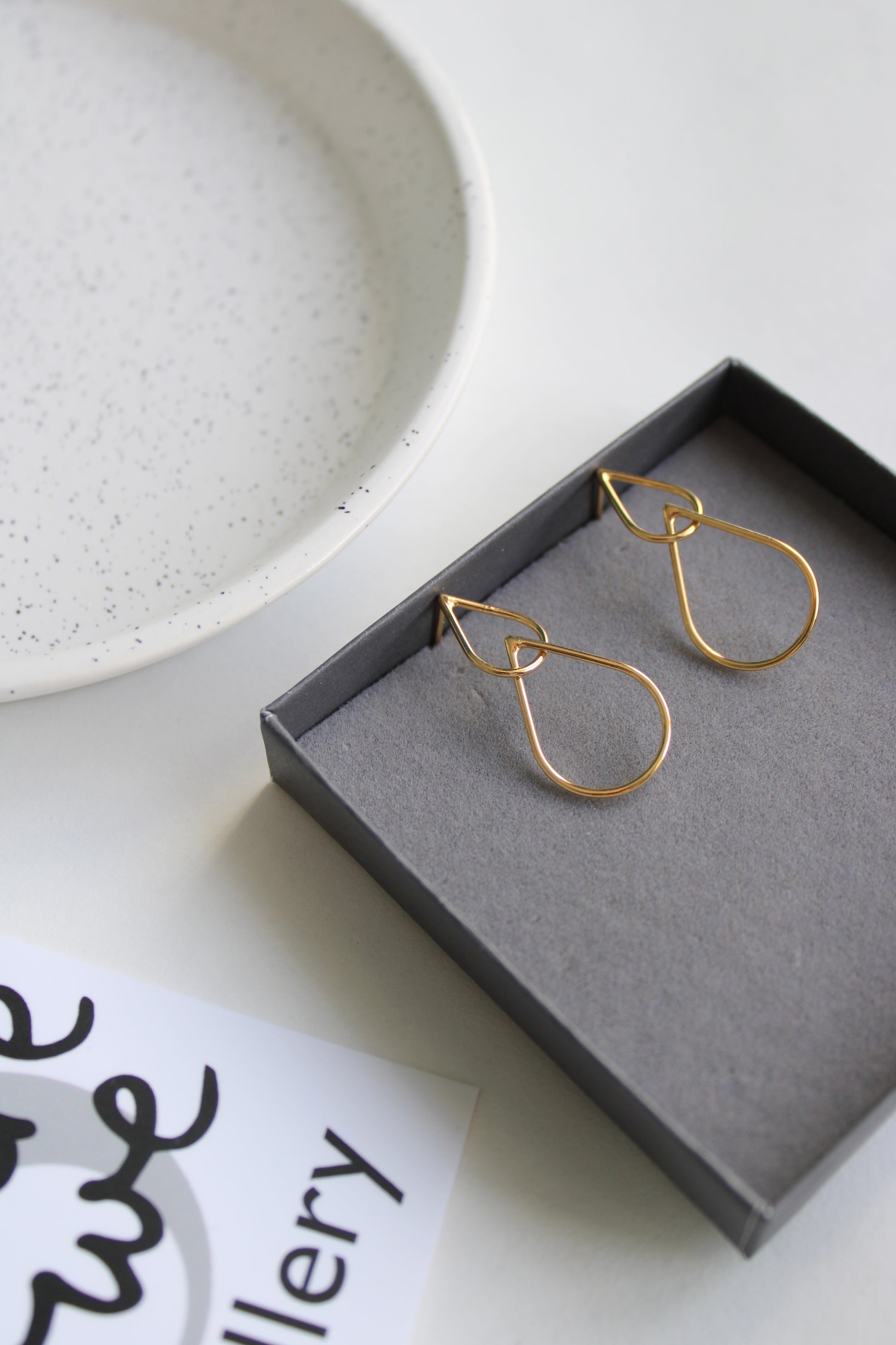 gold double teardrop earrings
