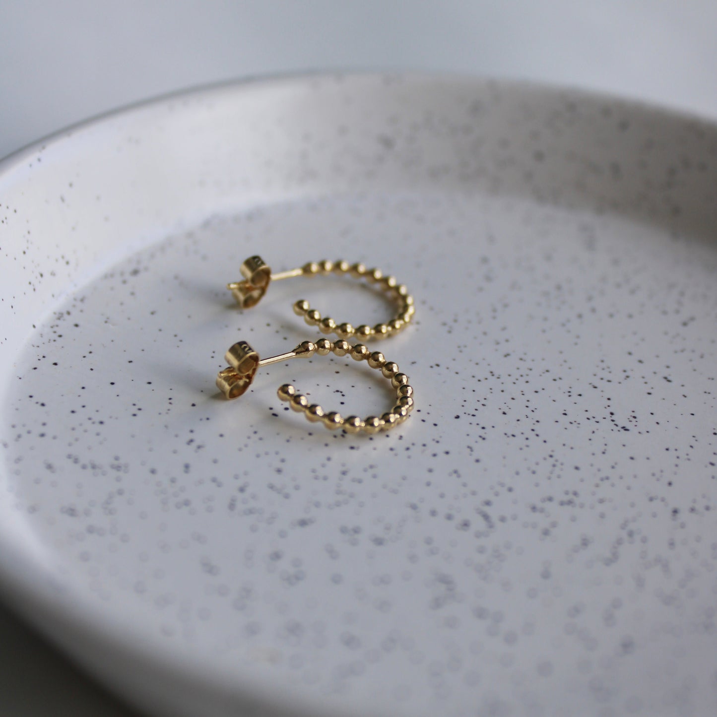 gold hoop earrings