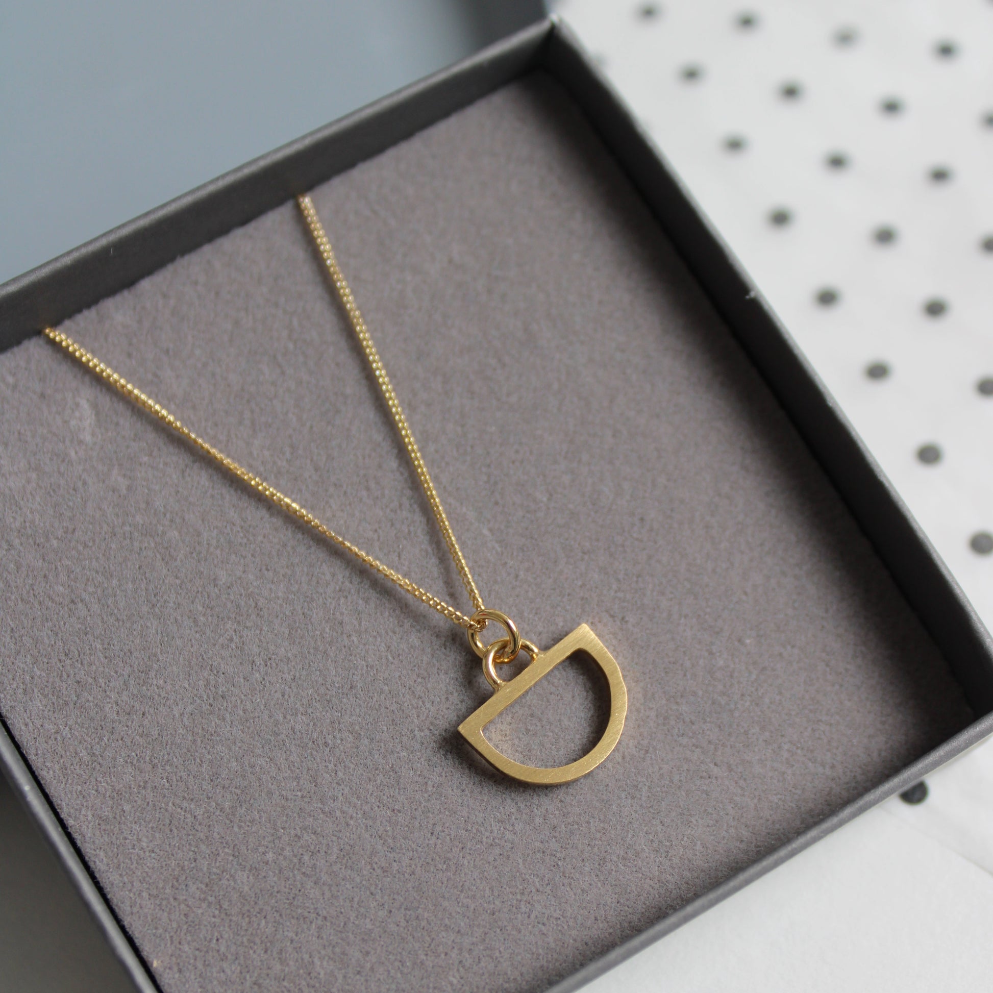 gold tiny arc pendant