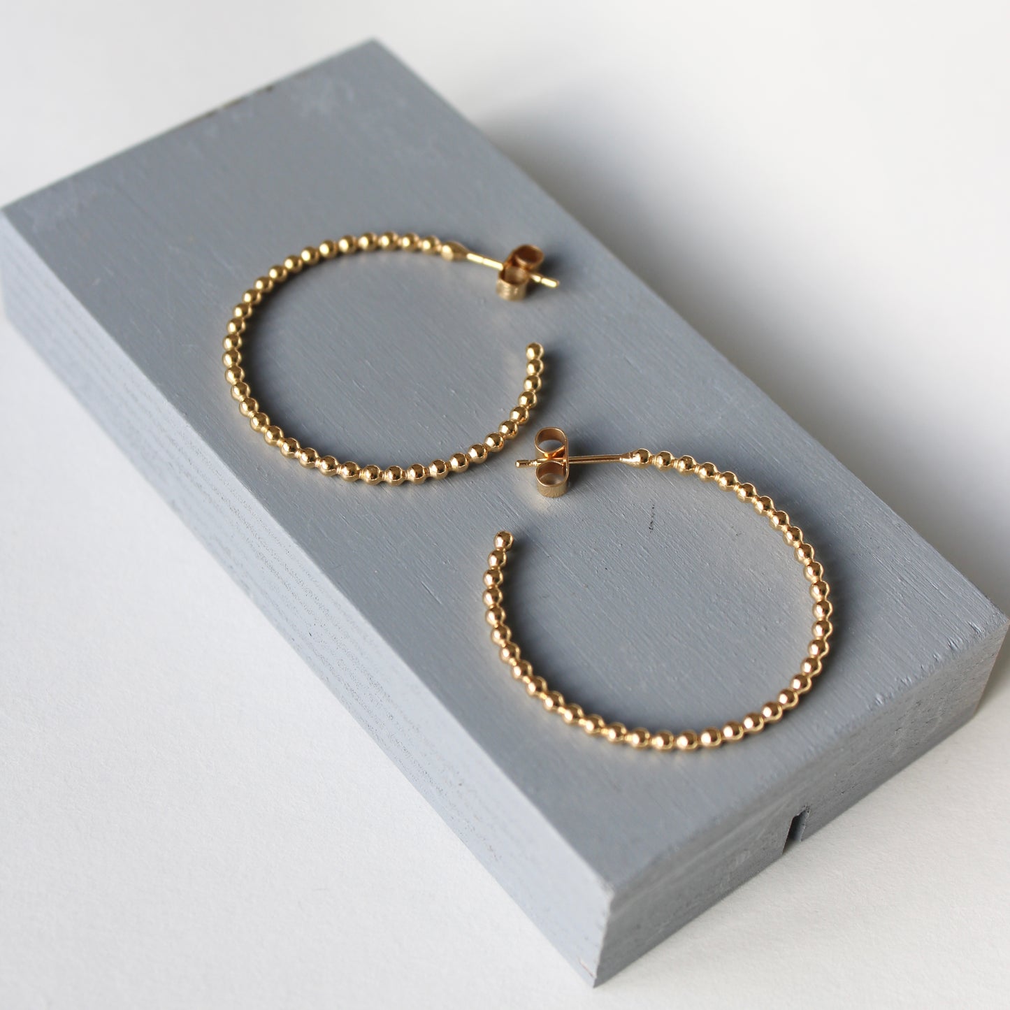 large dotty gold vermeil hoop earrings