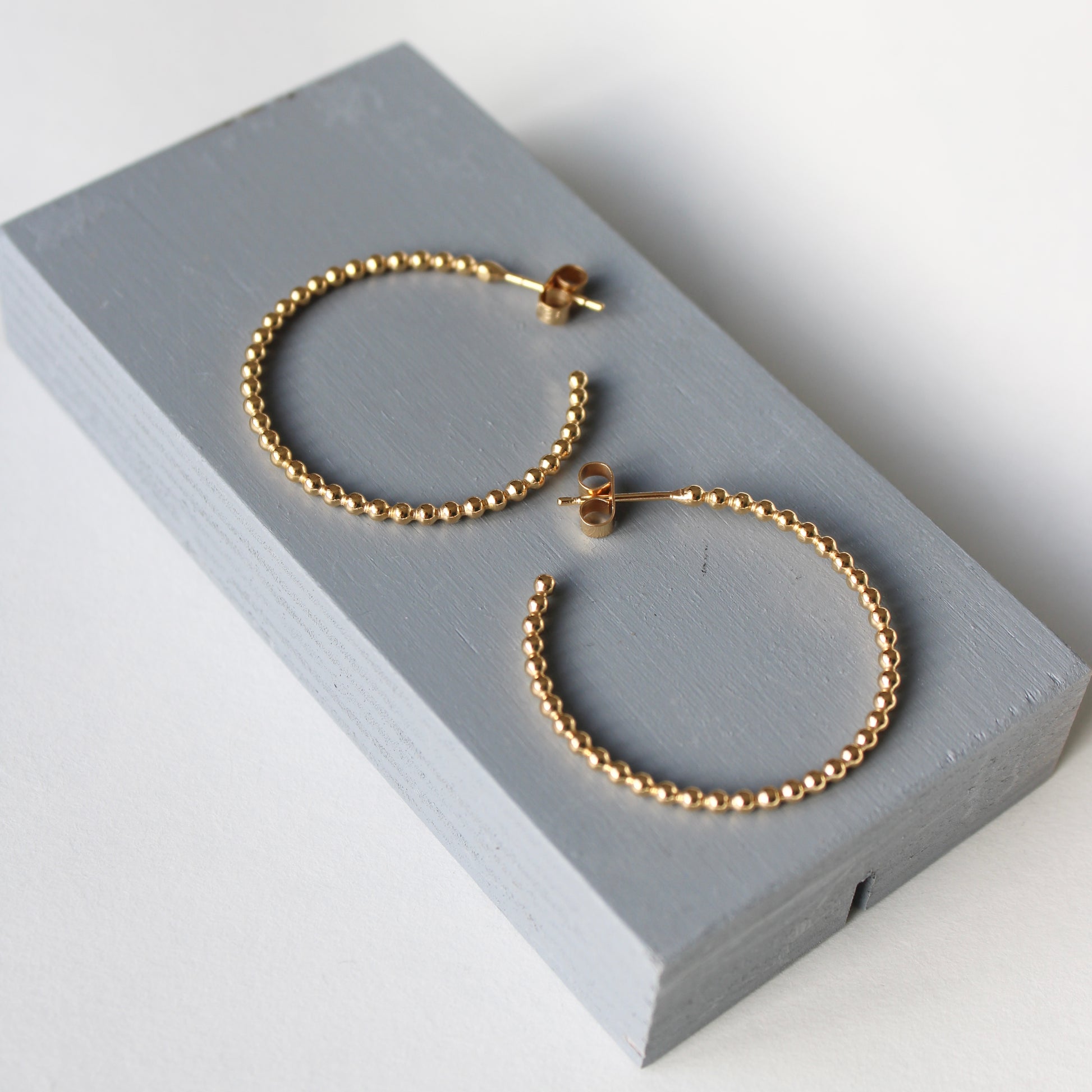 large dotty gold vermeil hoop earrings
