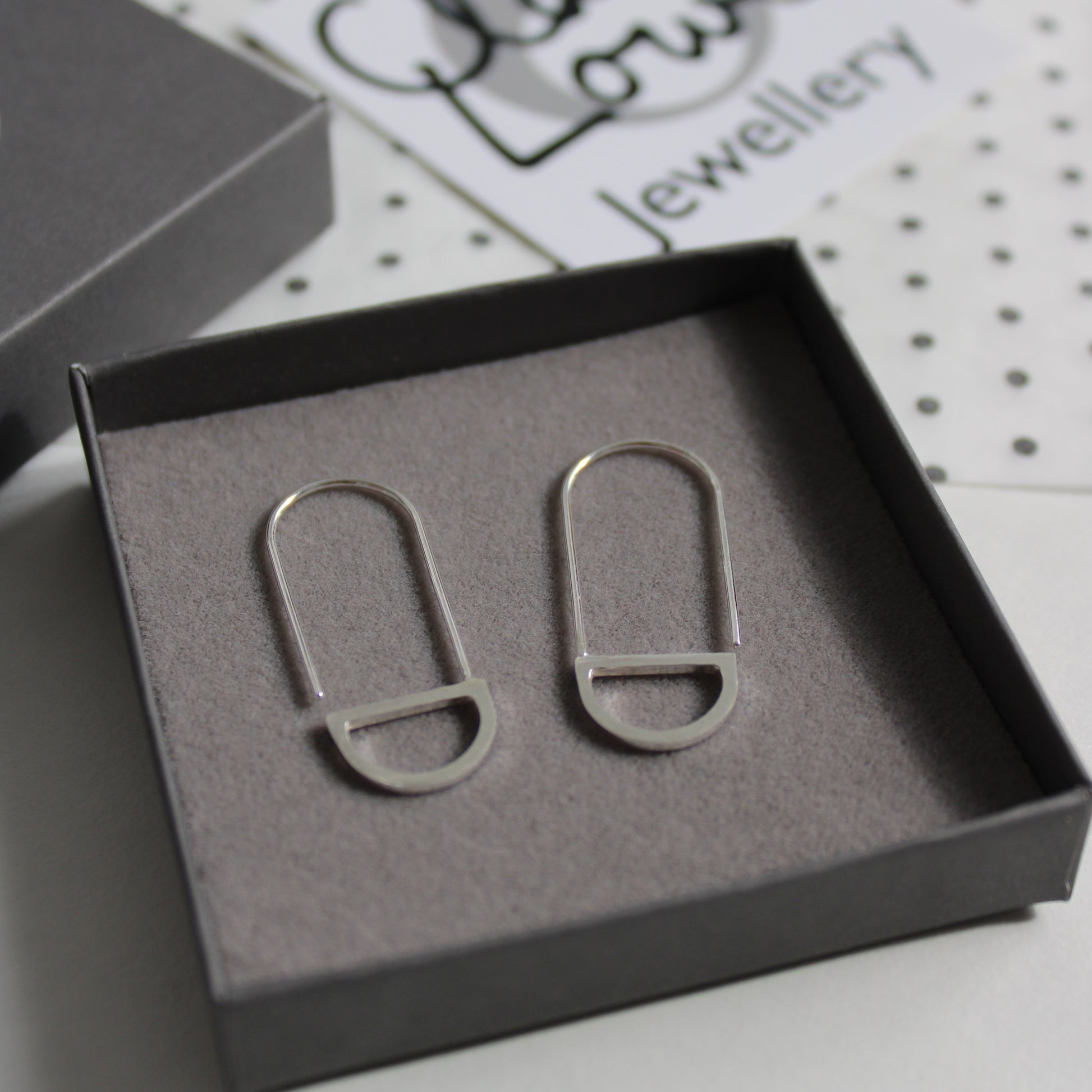 silver arc loop earrings