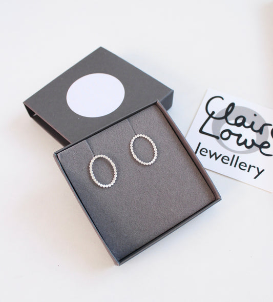 silver dotty oval earrings