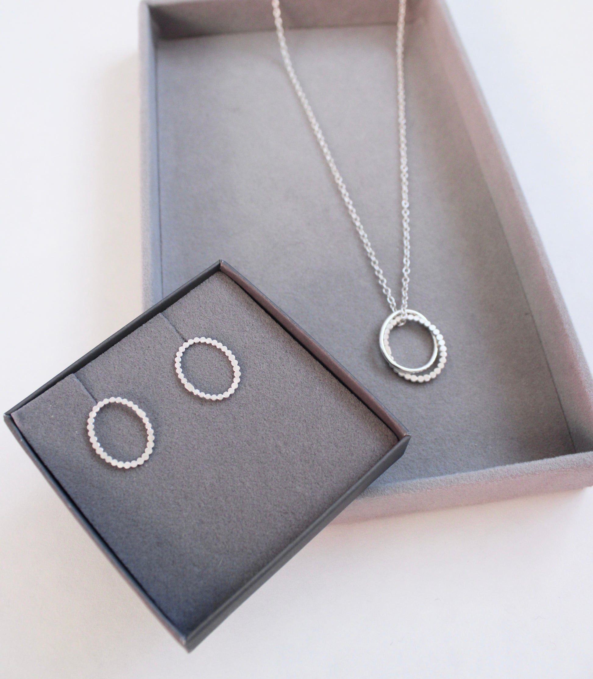 silver dotty oval studs with double pebble pendant