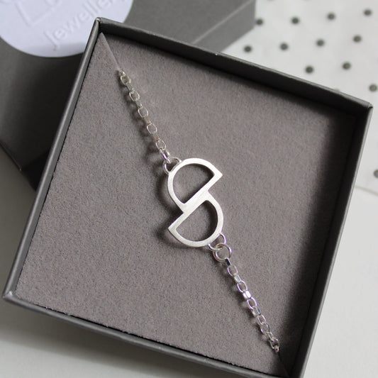 silver double arc bracelet
