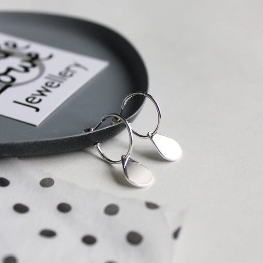 silver hoop earrings with teardrops