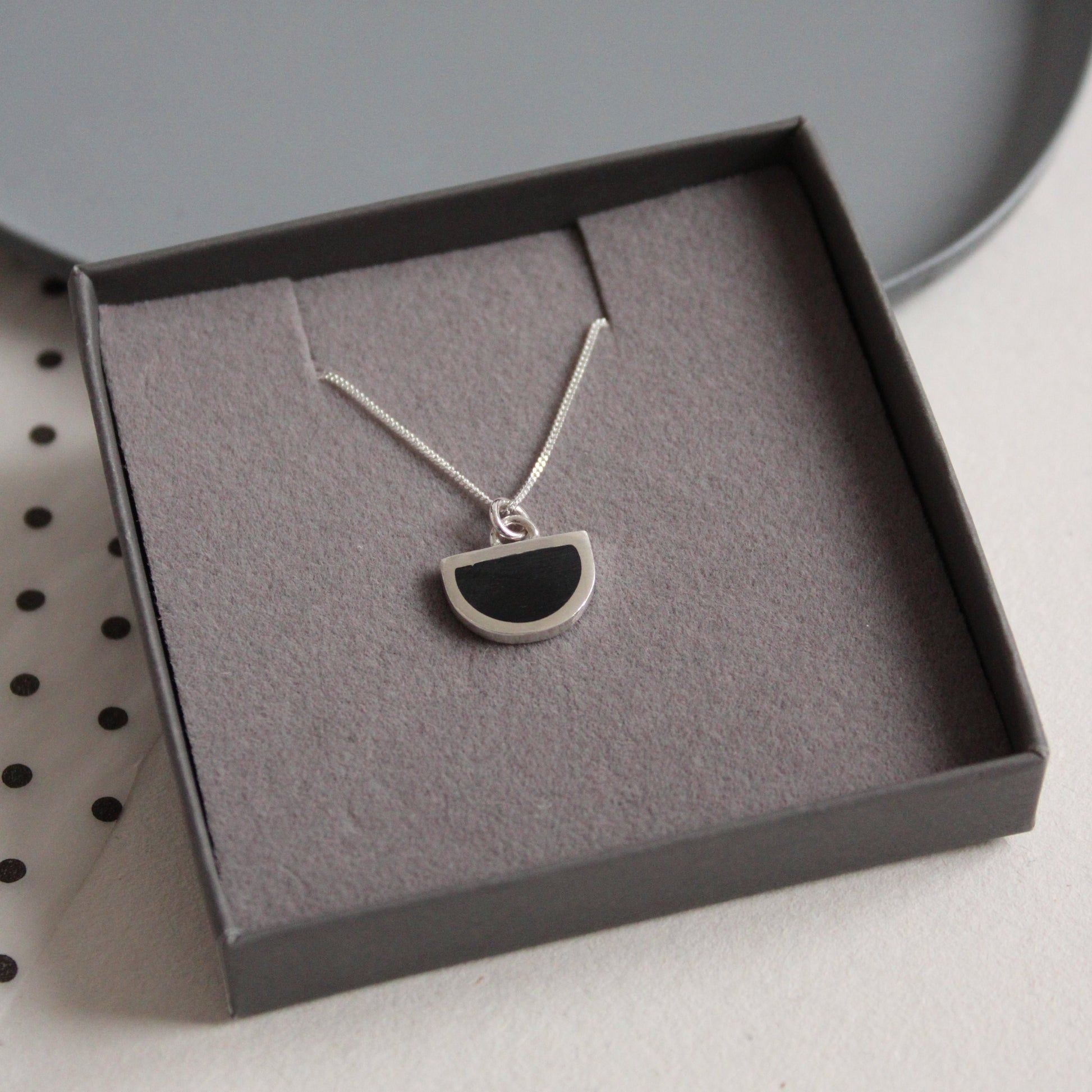 tiny black arc pendant box