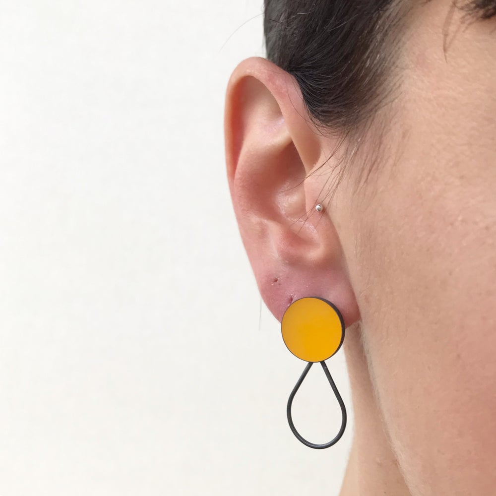 Large yellow stud earrings
