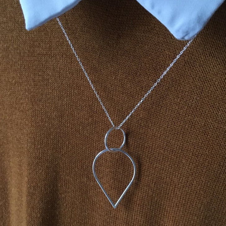 Silver teardrop and circle pendant