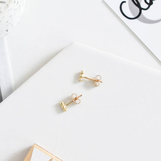 yellow gold dotty bar studs