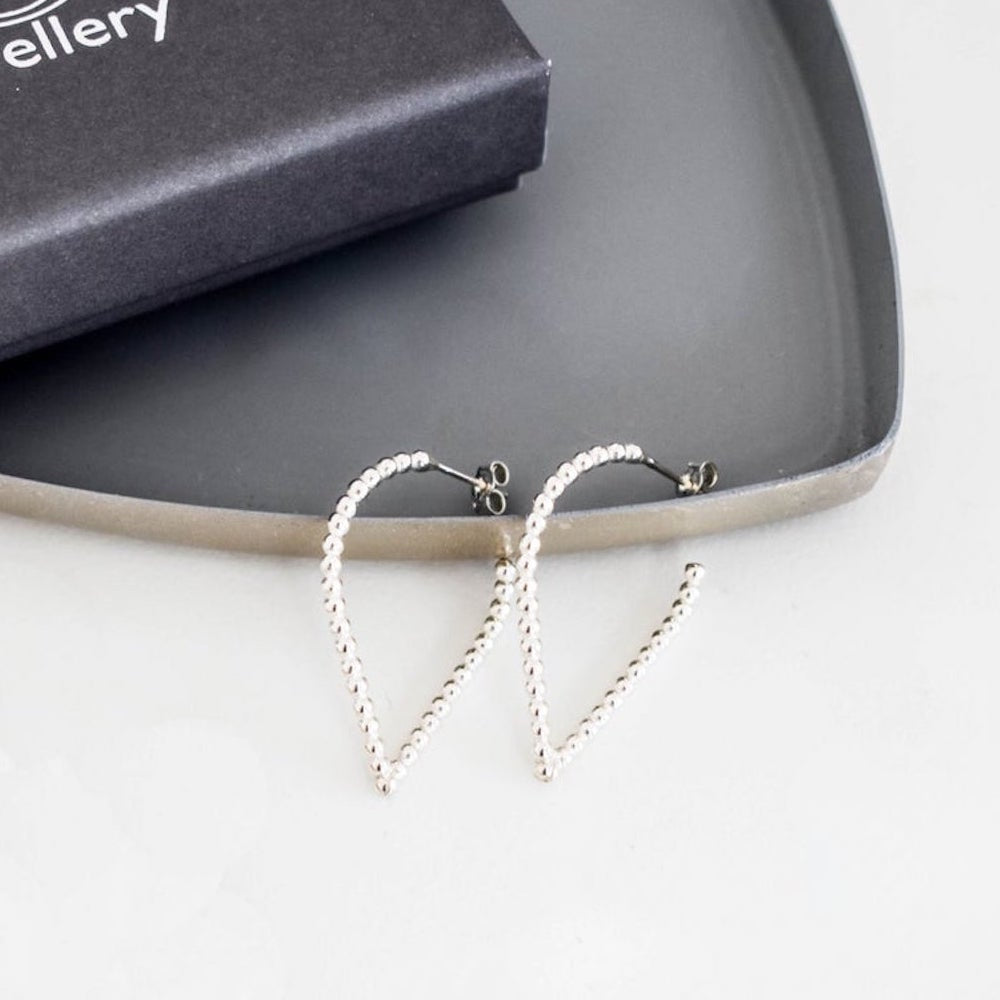 dotty silver teardrop hoop earrings