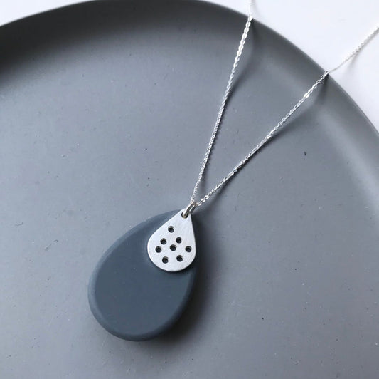 grey resin and drilled silver teardrop necklace