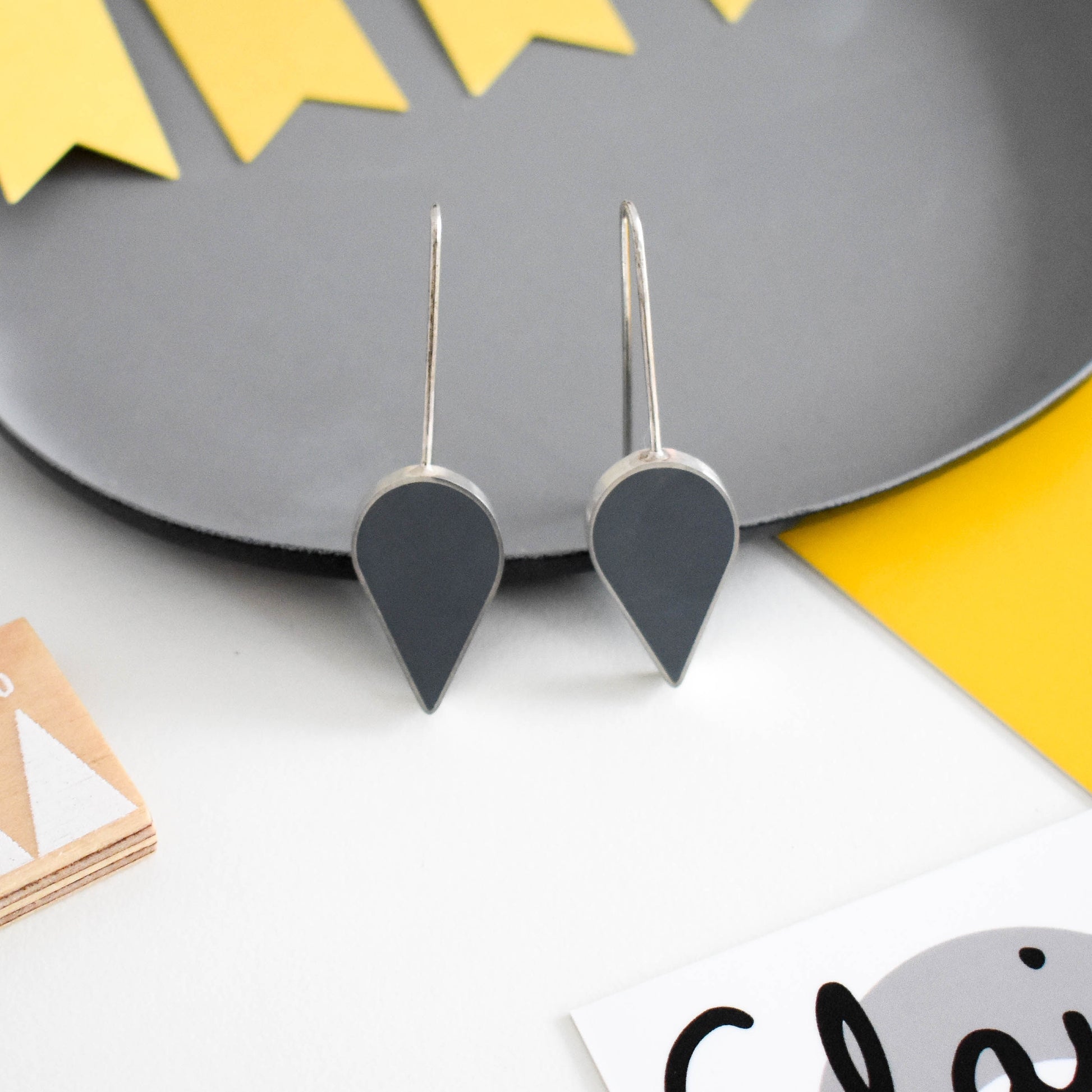 silver and grey resin earrings