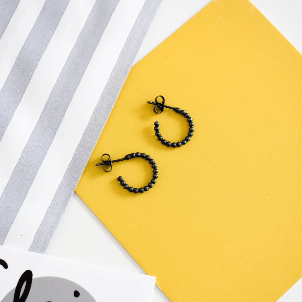 Dotty silver hoop earrings